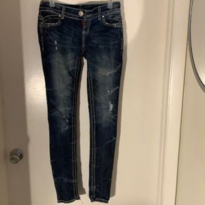 Almost Famous brand blue jeans